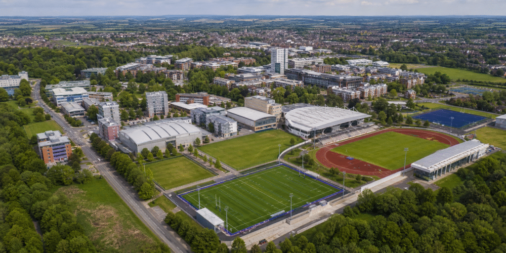 Aerial view of Loughborough University UK campus showing sports facilities and academic buildings
